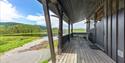 Balcony at the cabin by the lake in summertime