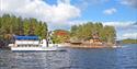 the tourist boat Tokedølen which has regular departures from the farm Hulfjell Gård during the summer season