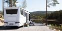 motorhome at Villmarkseventyret camping with a view of the water