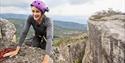 lady climbing on Gygrestolen in Bø