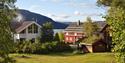 the farmhouses at Fossumsanden camping and cabin rental