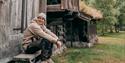 Man takes in the surroundings at Fyresdal Bygdemuseum.