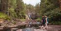 2 ladies standing by the Garvann falls in Skien