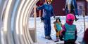 mother with child in the ski lift at Gausta ski center