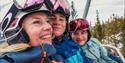 mother with child in the ski lift at Gausta ski center