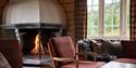 living room with fireplace in cabin to Gaustablikk mountain cabins