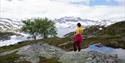 lady looking at the mountains in the background