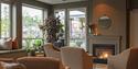 the fireplace in the lounge at the Home Hotel Bryggeparken