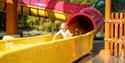 boy in a water slide at Foldvik family park