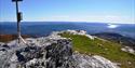 Photo from Skrubbelinuten at Lifjell, a summit that reaches 1121 meters above sea level. Blue sky and beautiful view over lake Norsjø and Telemark.