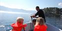 man and child on a boat trip