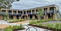 The newly built Hotell fritidsparken from the outside with a playground