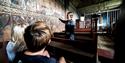 A guided tour of Eidsborg stave church. Vest-Telemark Museum.