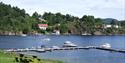 Dikkon bathing area and the jetty for leisure boats on Sandøya