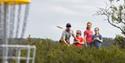 father canoeing with his daughters, family playing frisbee golf at Vierli, Rauland