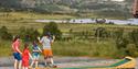 family plays mini golf at Vierli, Rauland