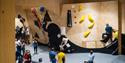 people climbing at "High under the roof"