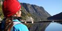 girl looking out over the Telemark Canal at Dalen