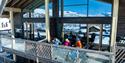 group sitting on balcony