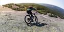 Cyclist cycles on Svaberg in Nissedal