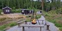 campfire at the Lille Nakksjø cabin farm in Villmarkseventyret