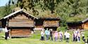 group of children on a tour of Tuddal village yard