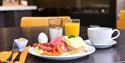 plate with different breakfast food