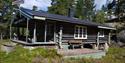 Sandvann cabin with terrace and bench