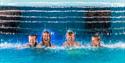 mother with her children under the waterfall in the bathing park at Quality Hotel Skjærgården in Langesund