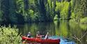 lady and 2 children canoeing in Siljan