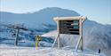 signs above the slopes at Gausta ski centre