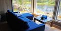 sofa overlooking the water