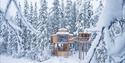 the wooden cabins from Å Camp in the winter