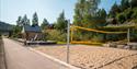 playground and sand volleyball court by the walking and cycling path "Kragerøbanen" in Drangedal