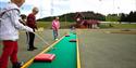 children play mini golf in Skien leisure park