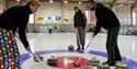 3 boys curling in Skien leisure park