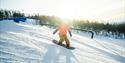 barn som kjører snowboard på Rauland skisenter