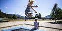children jump on the trampoline at Straand Sommerland in Vrådal