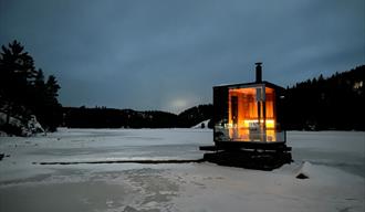 sauna on a frozen lake