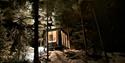 cabin from Spegle in the forest on a winter's evening