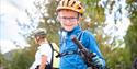 Boy with bicycle equipment
