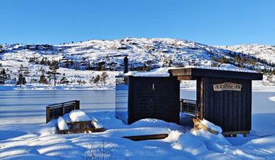 Panorama sauna in winter with snow