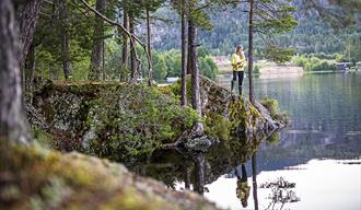 lady fishing in a fishing lake in Vrådal
