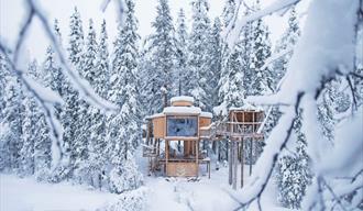 the wooden cabins from Å Camp in the winter