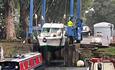 Boat being lifted out of water