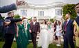 Wedding couple in front of Henley Greenlands Hotel