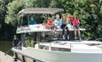 Family cruising on the River Thames