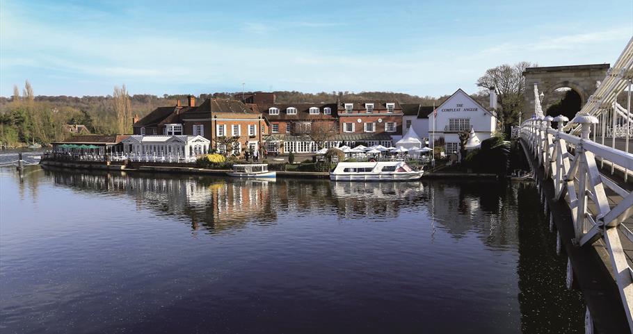 View of Macdonald Compleat Angler Hotel and suspension bridge at Marlow, River Thames