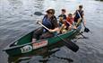 Paddling in a canoe on the River Thames. Moose Canoe Hire