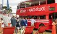 Double decker bus offering Pimms O'Clock in the private hospitality area at Henley Regatta